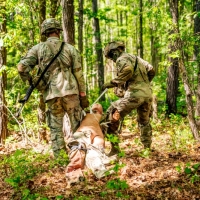 Scout teams from across the globe compete in the 2025 Gainey Cup Best Scout Squad Competition in the Round Robin Proficiency Skills Lanes event April 29, 2025, on Fort Benning, Georgia. During this event, Scout teams Simulate javelin live fire, medical skills lane, and dissassemble/reassemble M4/.240/.50 cal weapons. (U.S. Army photo by Daniel Marble)