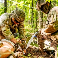 Scout teams from across the globe compete in the 2025 Gainey Cup Best Scout Squad Competition in the Round Robin Proficiency Skills Lanes event April 29, 2025, on Fort Benning, Georgia. During this event, Scout teams Simulate javelin live fire, medical skills lane, and dissassemble/reassemble M4/.240/.50 cal weapons. (U.S. Army photo by Daniel Marble)