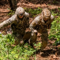 Scout teams from across the globe compete in the 2025 Gainey Cup Best Scout Squad Competition in the round robin proficiency skills lanes event April 30, 2025, on Fort Benning, Georgia. During this event, scout teams simulate javelin live fire, medical skills lane, and disassemble/reassemble M4/.240/.50 cal weapons. (U.S. Army photo by Joey Rhodes II)